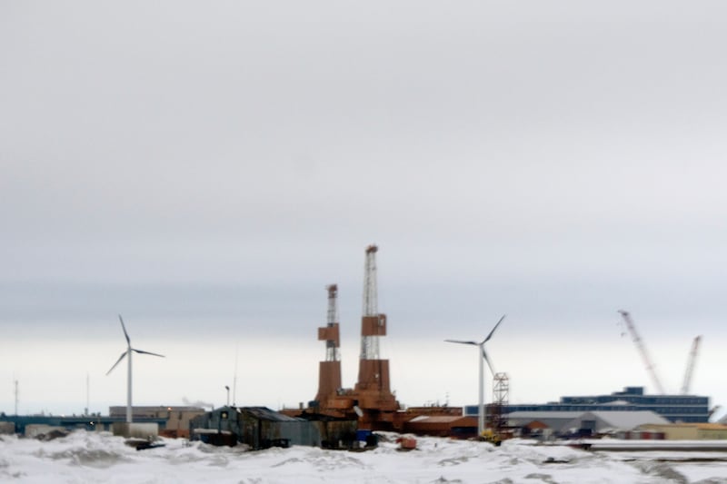 This image taken through a window of a plane shows wind turbines in Deadhorse, Alaska on...