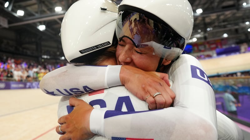 Kristen Faulkner of the United States celebrates with her teammate Jennifer Valente, left,...