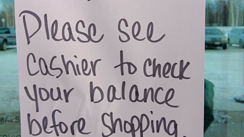Signs posted at Cubby's in Talkeetna warning customers to check SNAP balances in light of...