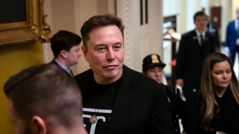 Elon Musk leaves after meeting with Senate Republicans, at the Capitol in Washington,...