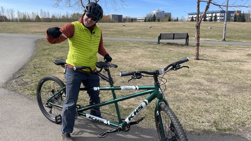 Bryce Gitzen is all smiles showing off his new tandem bike from Challenge Alaska.