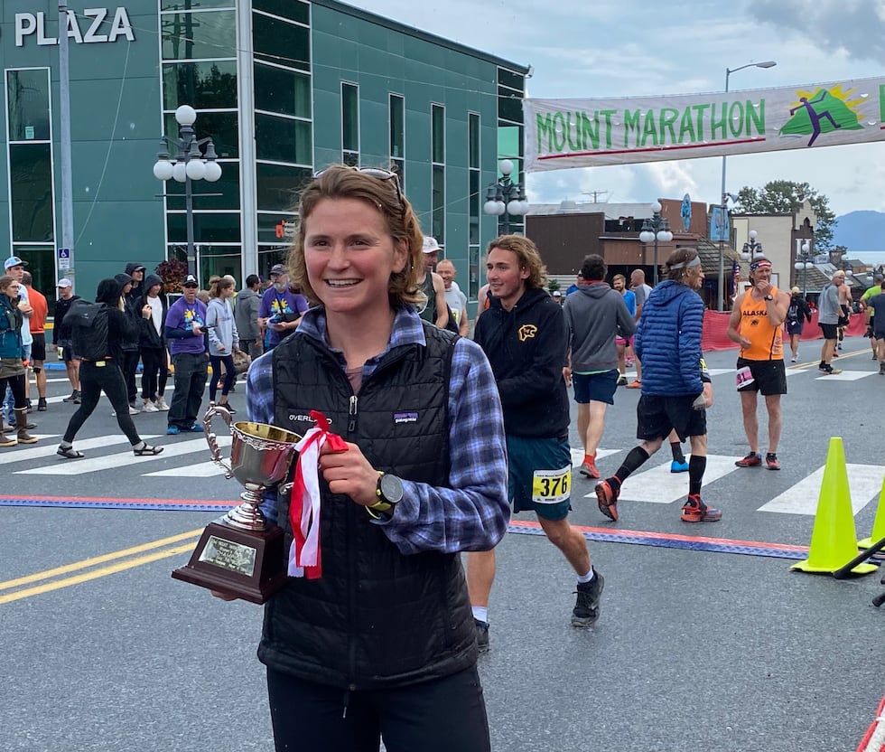 Seward's Hannah Lafleur celebrates with her first-place trophy after winning the women's Mount...