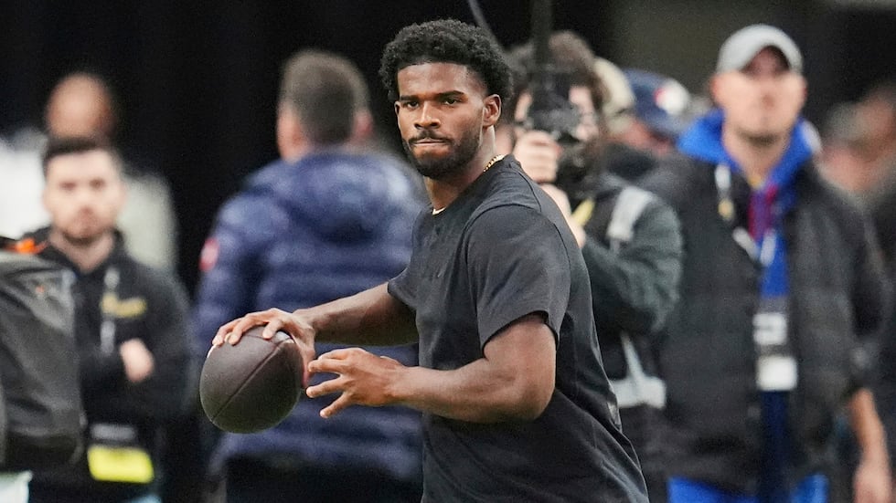 FILE - Colorado quarterback Shedeur Sanders takes part in passing drills during Colorado's NFL...
