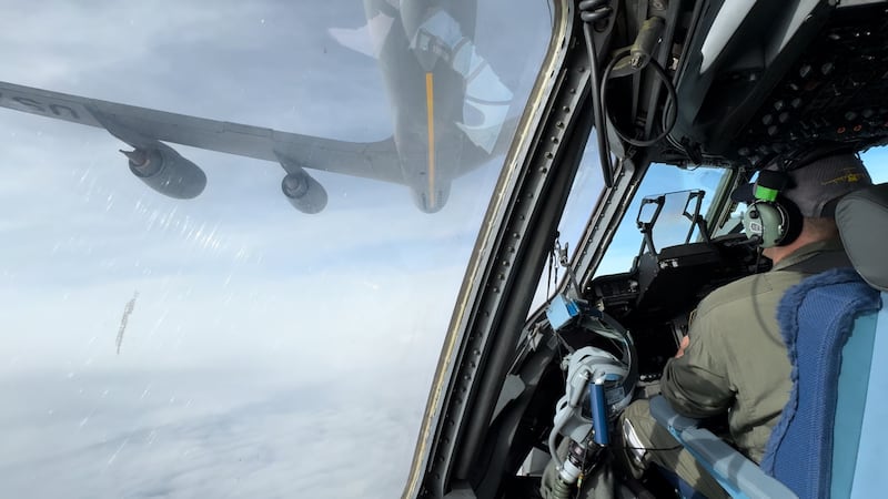 Lt. Col. Brian Marasco with the 176th Wing commands a C-17 cargo jet out of JBER as he links...