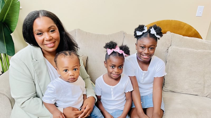 Mariah with her kids ages 14 months, 4 and 9 years old.