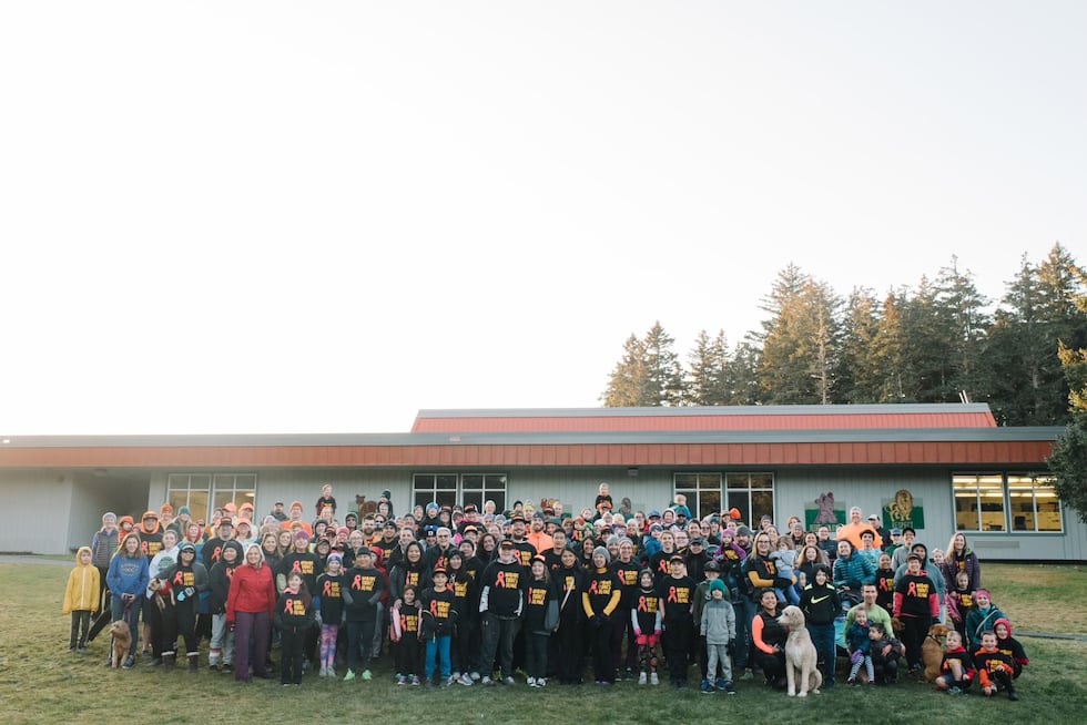 A photo of the community rallying in support of Emmitt