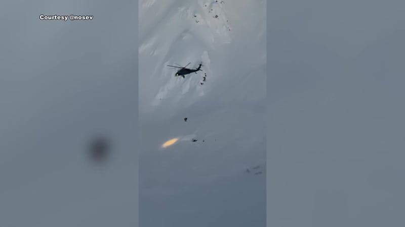 Sliding headfirst down a mountain — mouth bloody — a skier survives an avalanche