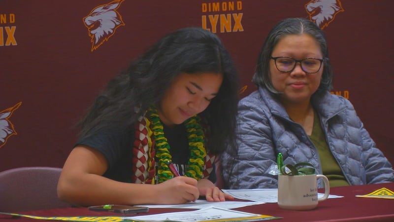 Dimond's Eleasha Sapon signs to play volleyball with the University of Alaska Anchorage at a...