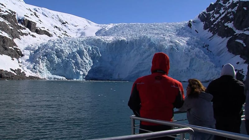 Passengers check out a glacier on the 26-Glacier Cruise out of Whittier, Alaska