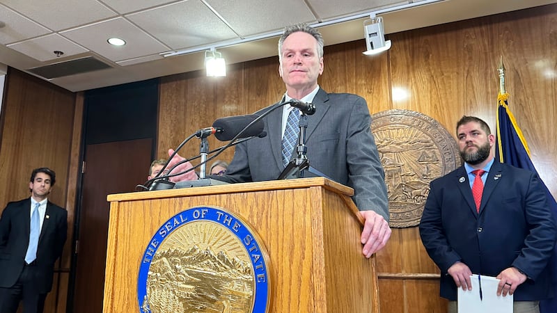 Alaska Gov. Mike Dunleavy gestures during a news conference on Thursday, Dec. 12, 2024, in...