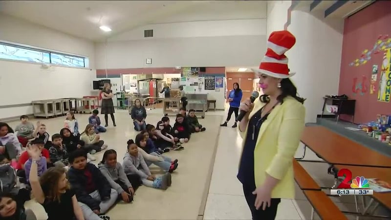 Spring Hill Elementary students create the roar of a thunderstorm inside their cafeteria