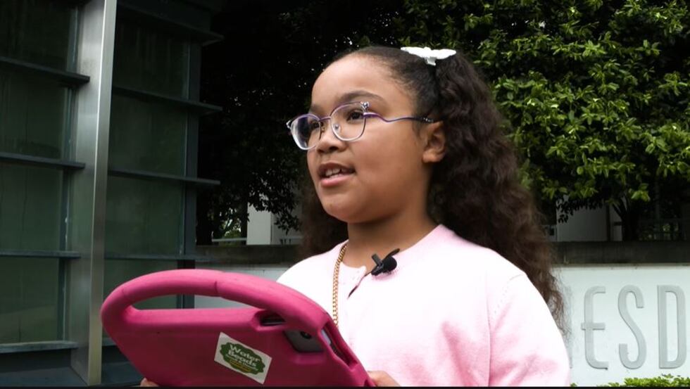 Kipley Haugen delivers a speech outside the CPSC's Maryland offices. The 8-year-old was...