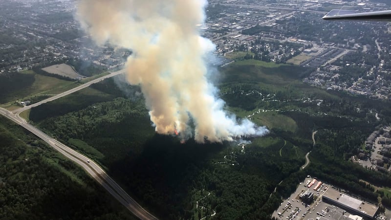 Smoke rises from a wildfire in East Anchorage, Alaska, on July 2, 2019. (Jason Jordet/Alaska...
