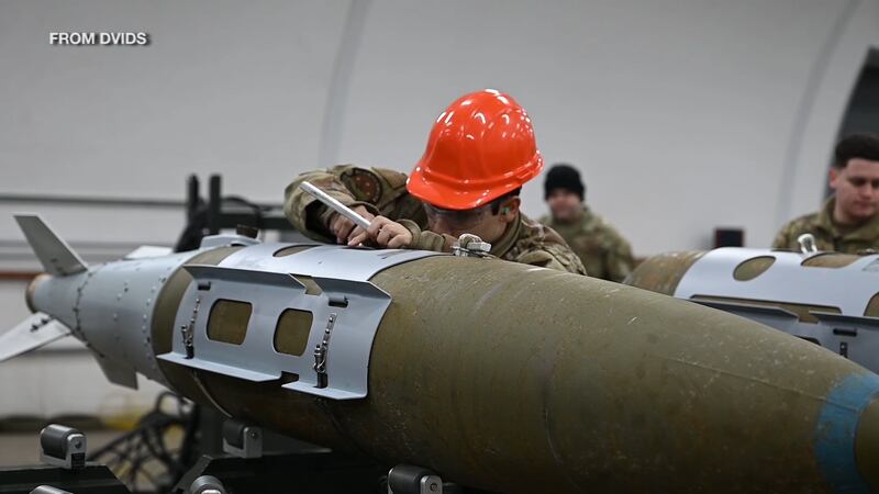 Soldiers build bombs at JBER during an exercise.