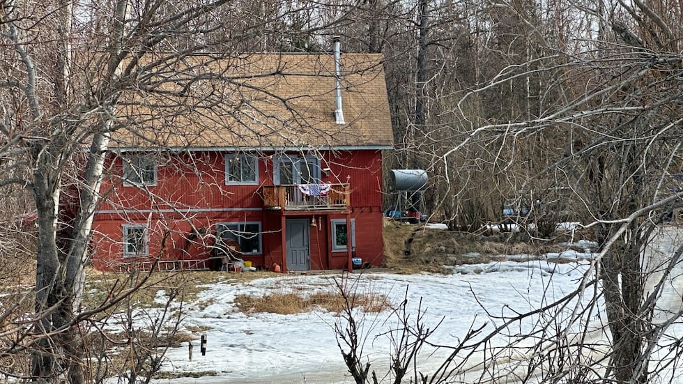 A home in Sutton, Alaska, where troopers say they found the body of 56-year-old Nicholas Wells...