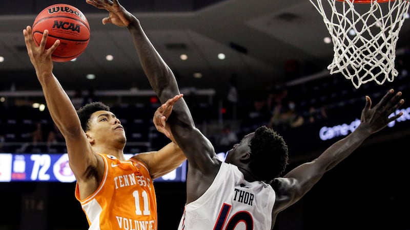 FILE - In this Feb. 27, 2021, file photo, Tennessee guard Jaden Springer (11) puts up a shot...