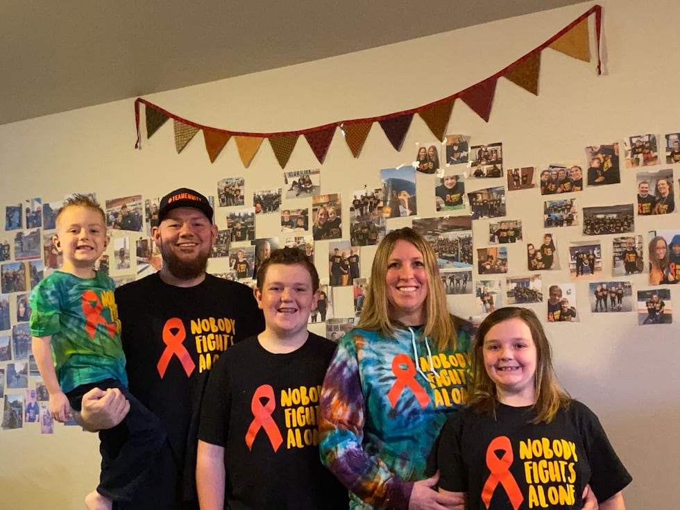 Emmitt (left) followed by day, brother, mother and sister.